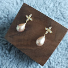 Load image into Gallery viewer, Freshwater pearl drops set with four petals floral style earposts