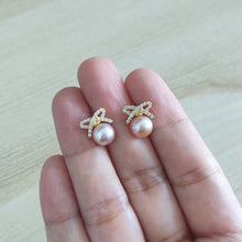 Load image into Gallery viewer, Pink Freshwater pearls set in Dainty Ribbon CZ studs
