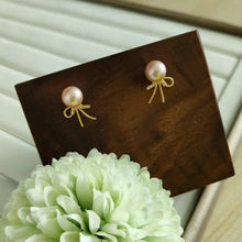 Load image into Gallery viewer, Light and Sweet Pink Freshwater pearls set in dainty ribbon style studs (Gold)