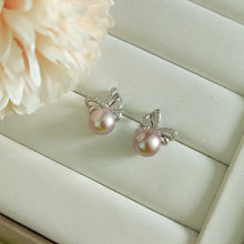Load image into Gallery viewer, Lavender Freshwater pearls set in CZ delicate ribbon style studs (Silver)