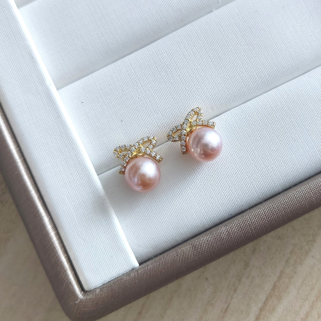 Pink Freshwater pearls set in Dainty Ribbon CZ studs
