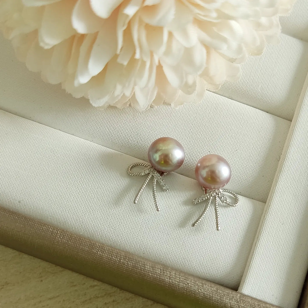 Lavender Freshwater pearls set in dainty ribbon style studs (Silver)
