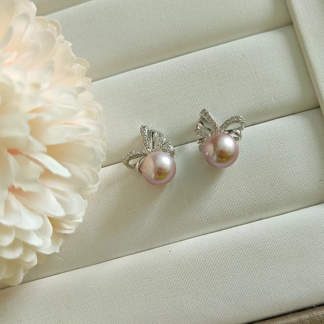 Lavender Freshwater pearls set in CZ delicate ribbon style studs (Silver)